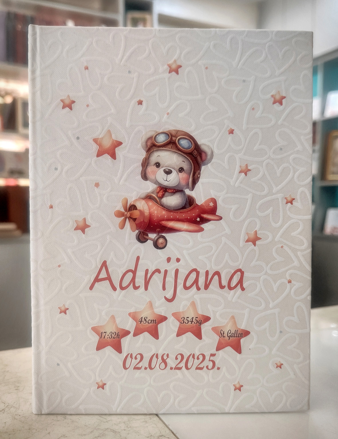 Personalizovani album za bebe sa fotografijama od rođenja